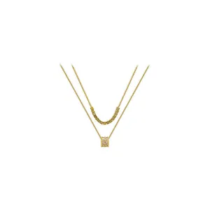 Elegante collana a doppio strato placcata in oro 18 carats con pendente a cilindro in zirconia