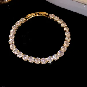 Detailed view of luxury 18k gold plated tennis bracelet with sparkling cubic zirconia