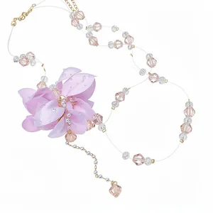 Elegant double-layered purple fabric flower necklace with faceted crystal beads