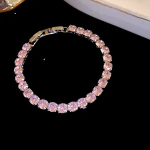Elegant tennis bracelet featuring sparkling pink round-cut zircons on a dark surface
