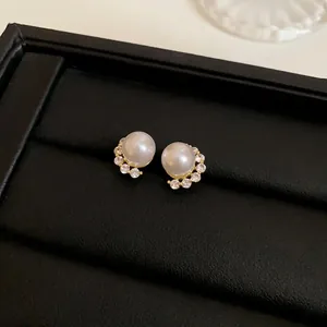 Elegant French style gold-plated pearl ear studs with sparkling rhinestone accents