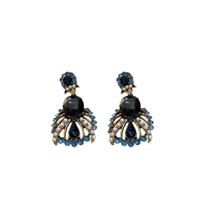 Vintage blue crystal teardrop earrings with faux pearls in an elegant retro luxury style