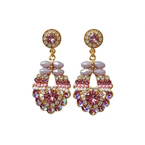 Exquisite gold-tone drop earrings with purple crystals and intricate beadwork details.