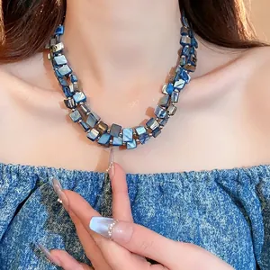 Collana vintage a doppio strato con perline di conchiglia blu e luce iridescente