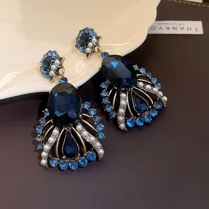 Vintage silver needle earrings with blue crystals and artificial pearls in teardrop design