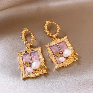 French vintage gold window frame earrings with white pearls and purple accents for women