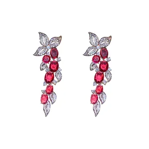Elegant red cubic zirconia leaf tassel drop earrings for women on white background.