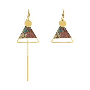 Asymmetrical ethnic style gold earrings with long tassel and vintage floral pattern.