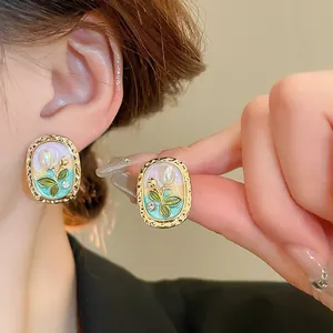 Monet Garden oil painting style floral pearl stud earrings with gold textured frame