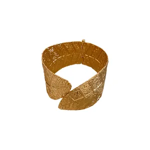 Elegant golden leaf-shaped textured cuff bracelet with hinged opening for modern women