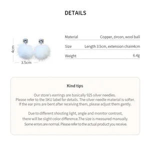 White pom-pom earrings with zircon details and 925 silver needles, size 3.5cm x 4cm.