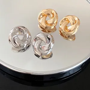 Elegant French style metal rose winding knot stud earrings in gold and silver finishes