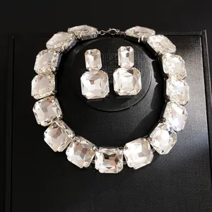 Detailed macro view of luxurious crystal necklace and matching earring jewelry set