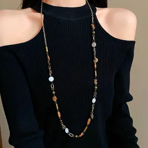 Elegant vintage ethnic style long sweater chain necklace with ceramic beads and gold links