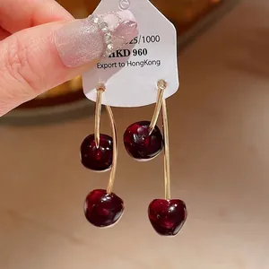 Elegant vintage red resin cherry drop earrings with silver needle hooks for women.