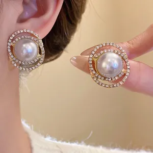 Elegant French vintage pearl halo stud earrings with sparkling rhinestones for women.