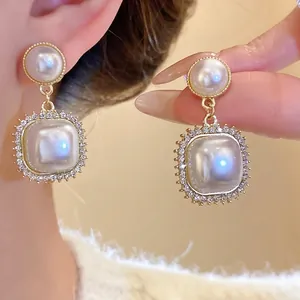 Elegant French vintage square pearl earrings with sparkling rhinestone detailing on gold-plated silver needle