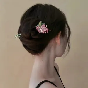 Elegant pink flower hair stick designed for traditional Chinese style bun hairstyles