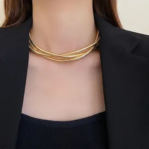 Woven multi-strand gold snake chain choker necklace in bold metal style for women