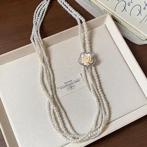 Elegant French vintage multi-strand pearl necklace with rhinestone rose flower pendant