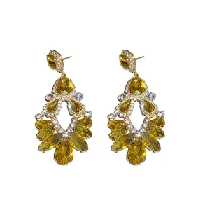 Elegant gold-tone drop earrings with yellow crystals and pave rhinestones