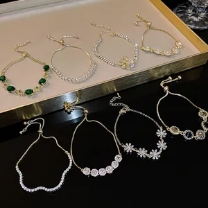 Elegant collection of adjustable zircon bracelets with emerald green and floral designs