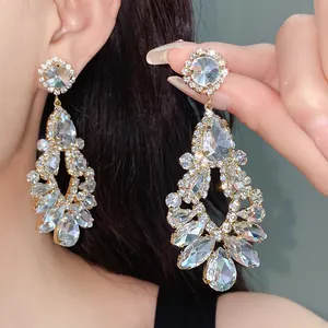 Luxurious S925 silver needle teardrop rhinestone tassel earrings in elegant palace style.