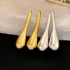 Minimalist polished teardrop dangle earrings available in gold and silver finishes