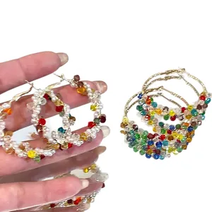 Vibrant colorful glass bead and pearl wrapped hoop earrings with dopamine style aesthetic