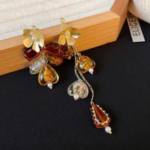 Vintage asymmetric floral tassel earrings with amber heart charms and small pearls