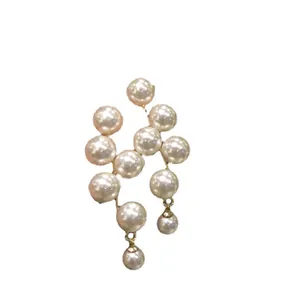 Eleganti orecchini pendenti geometrici con frange di perle e ago d'argento donna