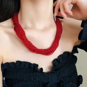 Elegant multilayer red seed bead necklace with vintage magnetic clasp design