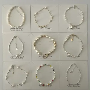 Elegant set of nine French vintage pearl bracelets with gold and silver accents for women