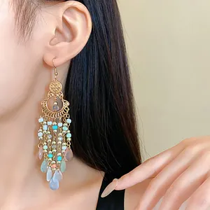 Exquisite Bohemian vintage long tassel earrings with colorful crystal beads on model
