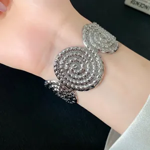 Statement silver textured spiral open cuff bangle for women with minimalist pleated design