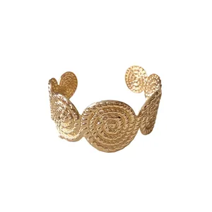Gold textured circular spiral open cuff bracelet with vintage ripple design