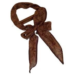 Elegant vintage brown paisley silk scarf necklace featuring a soft fabric bow tie
