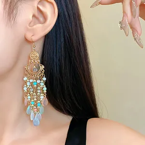 Detailed view of bohemian retro long tassel earrings with colorful crystal seed beads