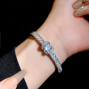 Elegant silver-toned bracelet with sparkling square zircon and pavé diamonds