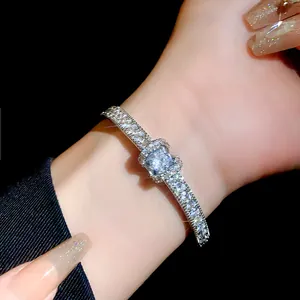 Close-up detail showing the sparkling square zircon on this silver fashion bracelet