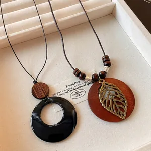 Ethnic Style Hollow Leaf Round Pendant Necklace Vintage Wood Resin Alloy Sweater Chain For Women Literati Jewelry