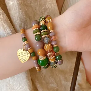 Vintage style multi-layered acrylic crystal beaded bracelet with heart charm for women