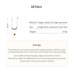 Detail view of tiger eye beaded necklace with dimensions and material specs.