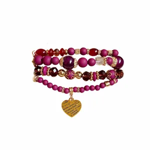 Beaded multi-layer bracelet with heart pendant and multi-language 'I love you' engravings