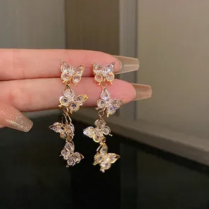 Elegant gold zircon butterfly tassel drop earrings with sparkling crystals