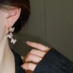 Elegant S925 silver needle zircon butterfly tassel earrings and ring set for women.