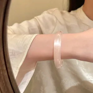 Elegant fashion icy pink resin bangle bracelet for women with minimalist round design