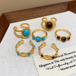 Set de anillos ajustables vintage bañados en oro de 18 quilates con turquesa y ojo de tigre