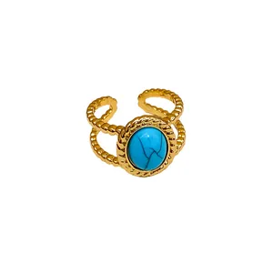 Anillo ajustable vintage chapado en oro de 18 quilates con piedra turquesa azul redonda
