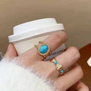 Anillos abiertos vintage bañados en oro de 18k con piedras turquesas y detalles boho